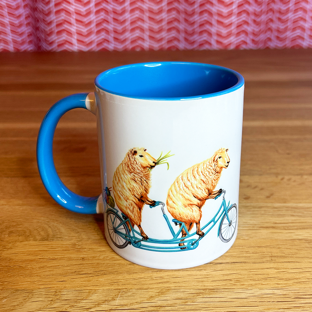 Sheep riding a Bike Mug: 11oz - 325ml
