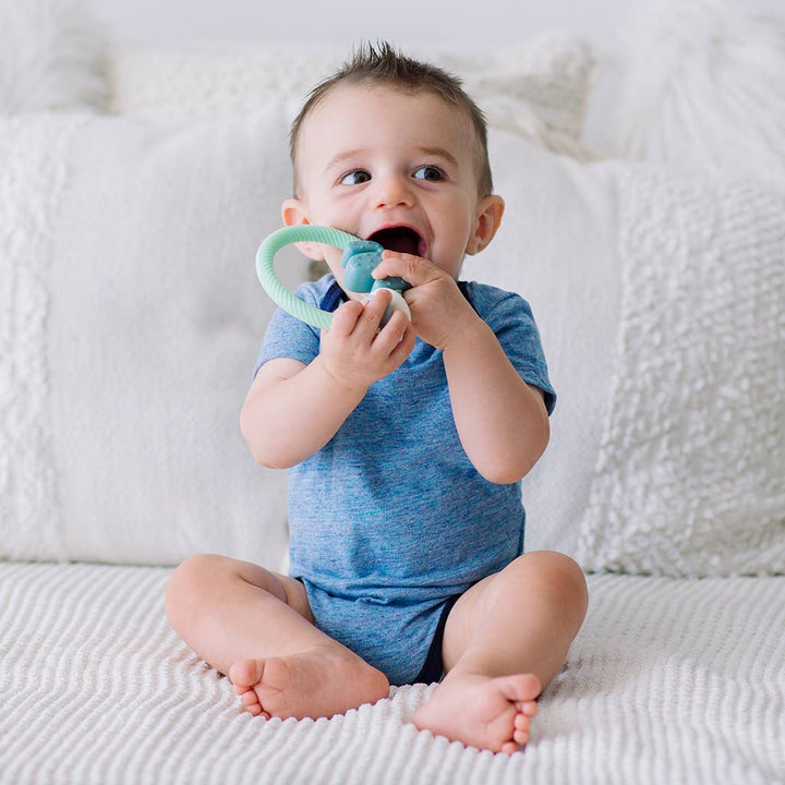 Ritzy Rattle™ Silicone Teether Rattles: Highland Cow